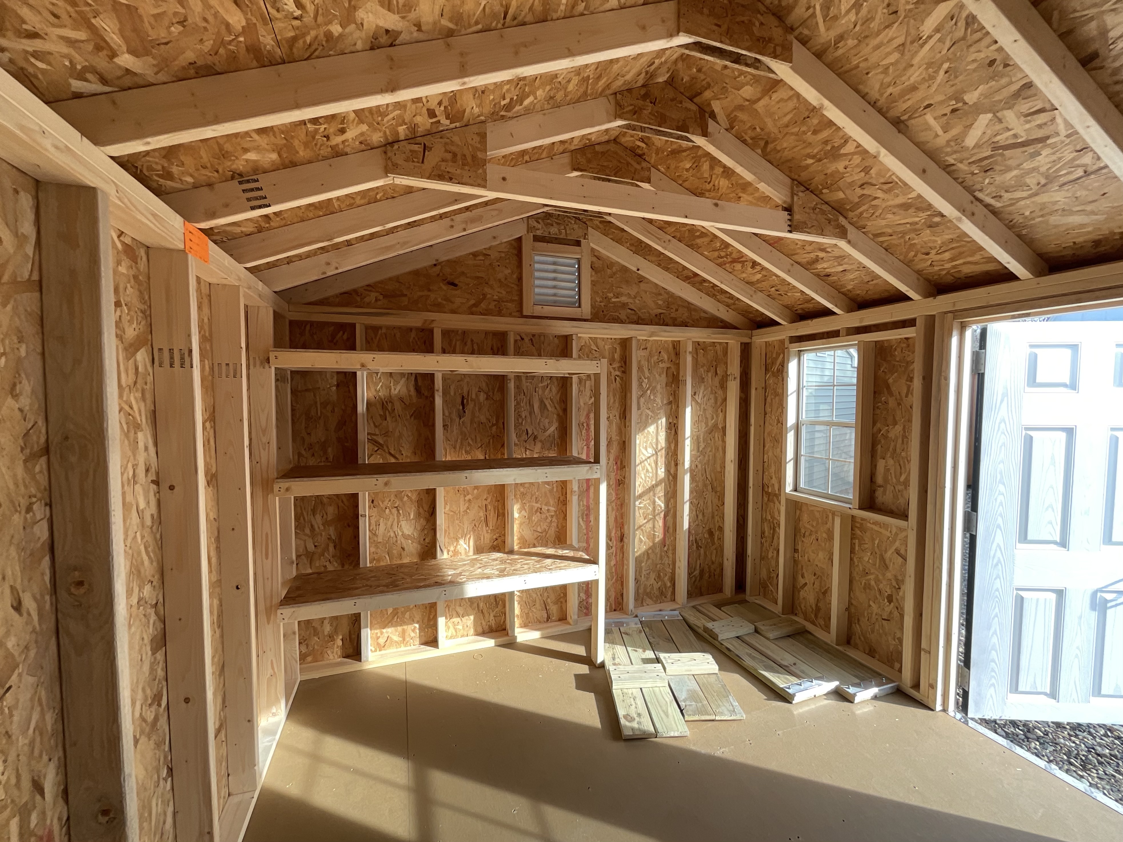 16" Shelves 5' Long on a Pine Creek Structures of Berlin Storage Shed