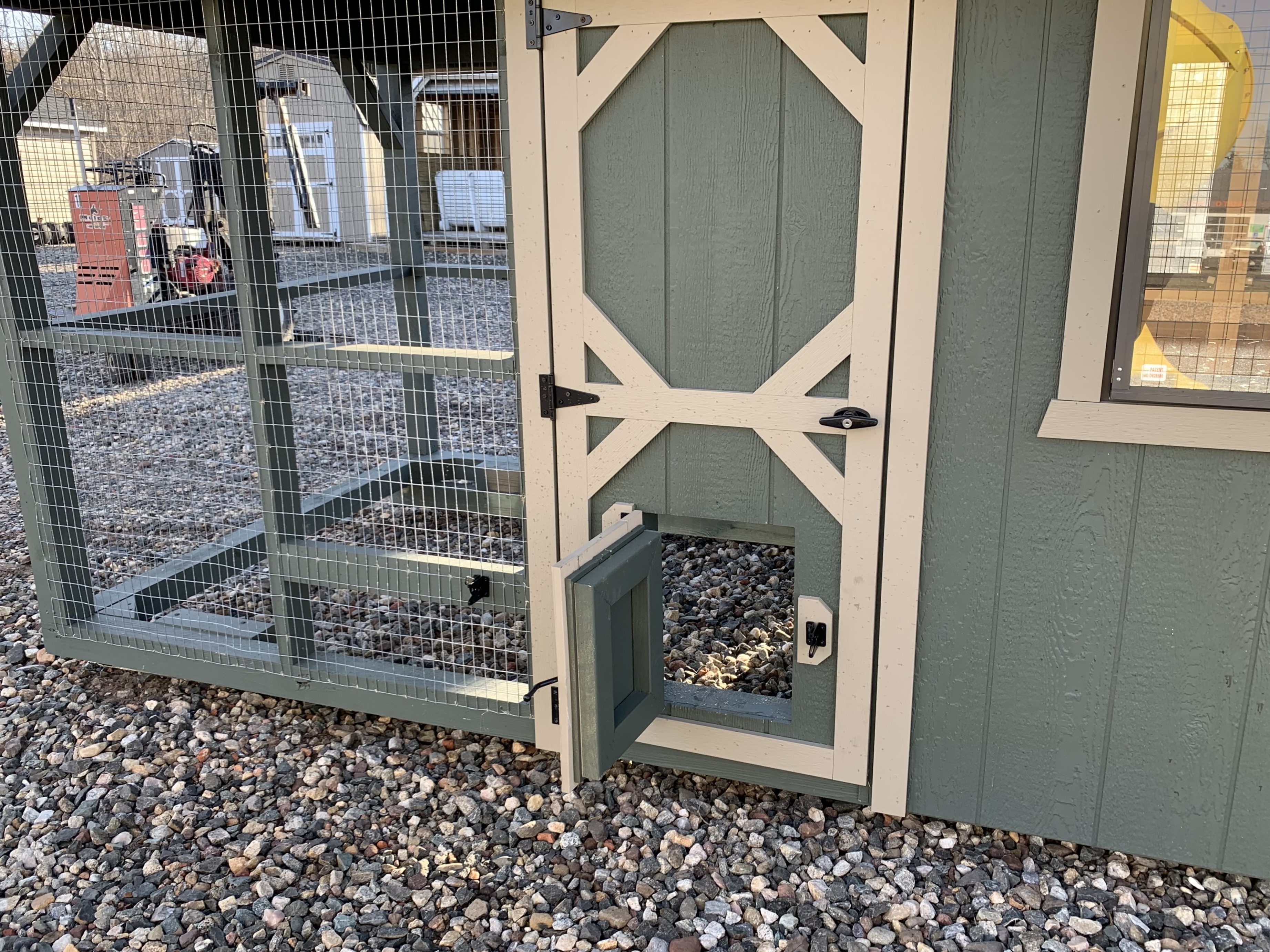 Chicken door on a Pine Creek Structures coop