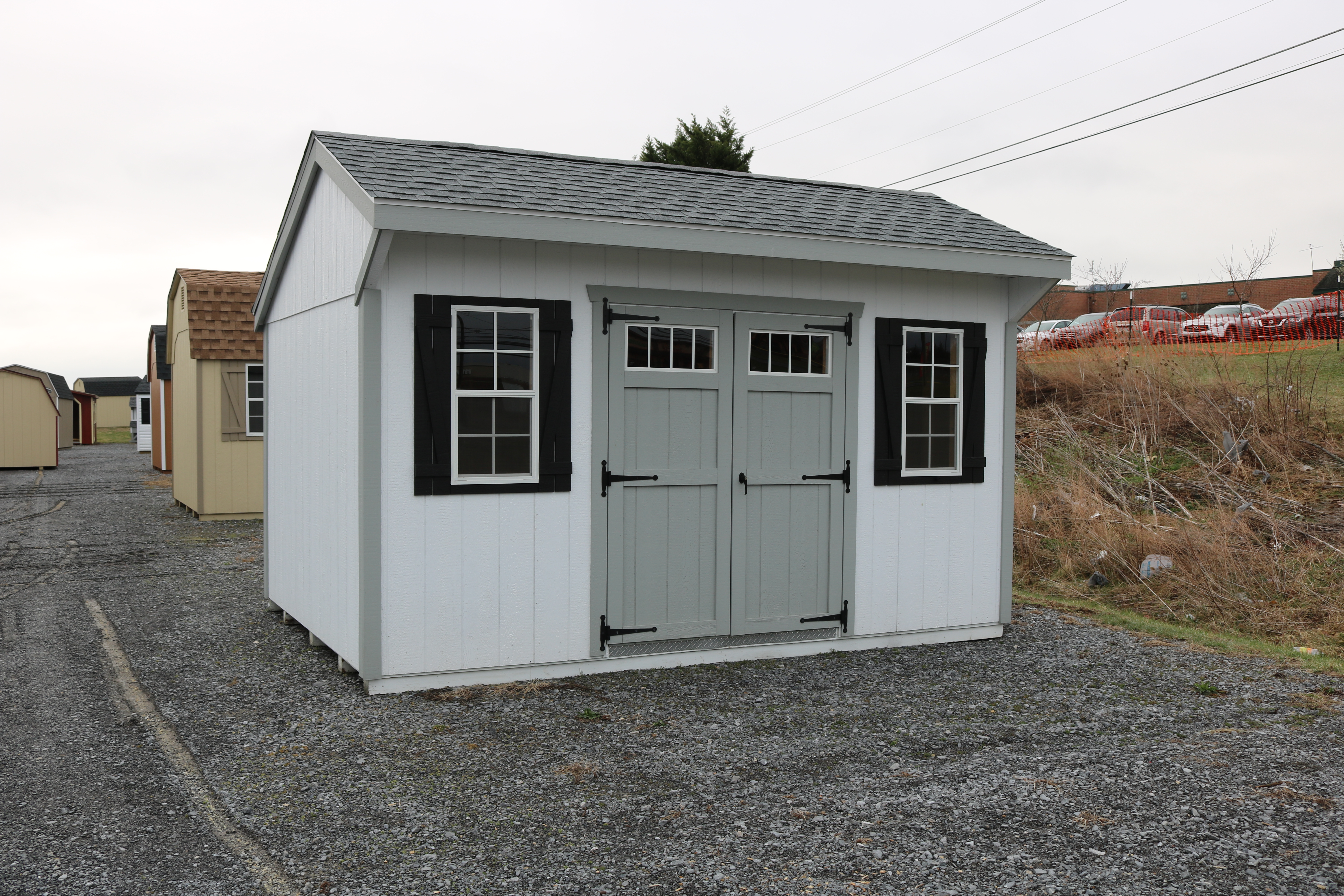 Pine Creek 10x14 New England Cottage with White walls, Light Gray trim and Black shutters, and Oyster Grey shingles